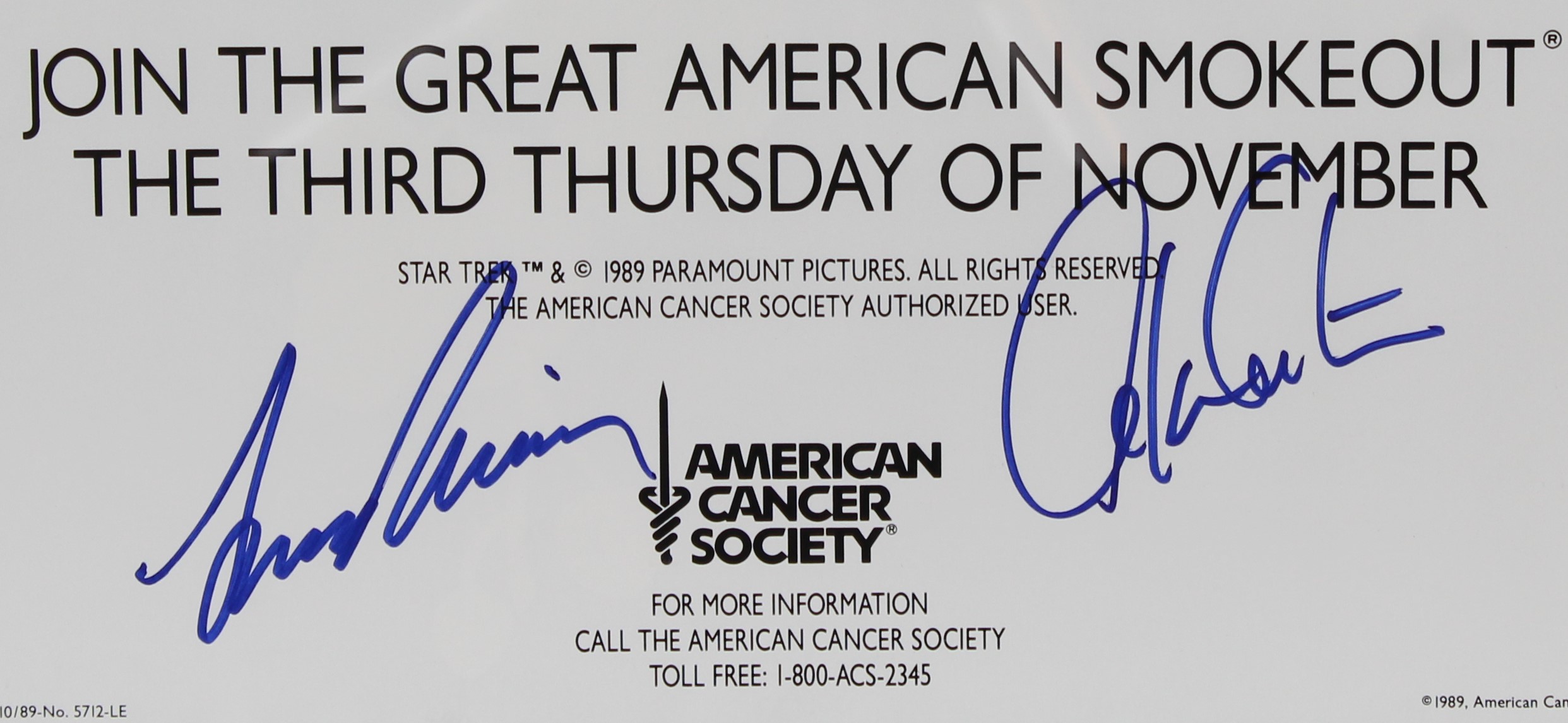 A close-up of the Leonard Nimoy and William Shatner autographs on the poster.