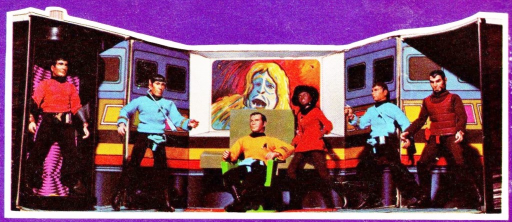 A photo of the Star Trek Enterprise Playset taken from the packaging of the Mego figures. It shows six figures on the bridge.