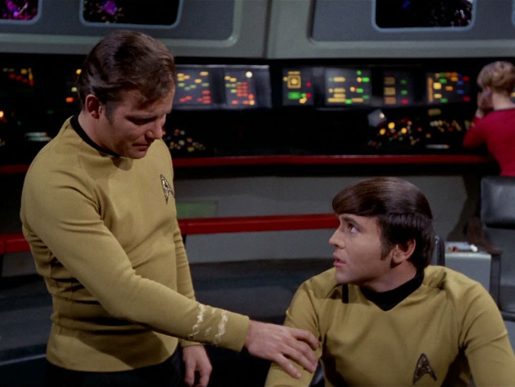 On the bridge of the starship, Captain Kirk and Ensign Chekov have a conversation about Chekov's feelings for Irina