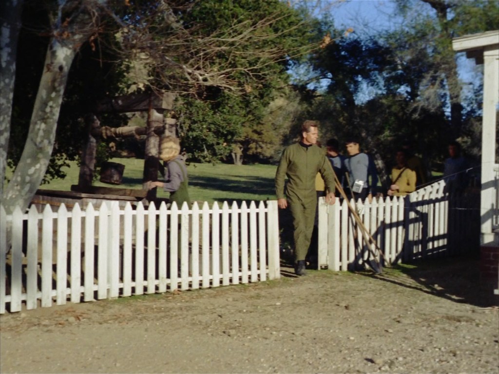 A screen cap from the Star Trek episode This Side of Paradise, showing a pastoral rural background. 